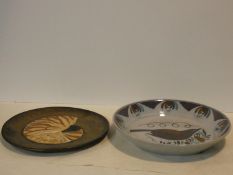 A charger with central nautilus decoration, signed R Mack and a Portuguese lustre glazed shallow