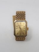 A 9ct gold vintage ladies Swiss Bueche Girod quartz watch, the octagonal signed dial with baton