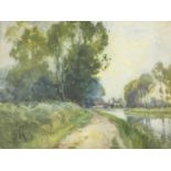 A framed and glazed watercolour, towpath by a canal with houses in distance, indistinctly signed.