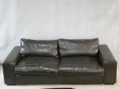 A vintage style brown leather down filled Collins & Hayes leather upholstered large two seater sofa.