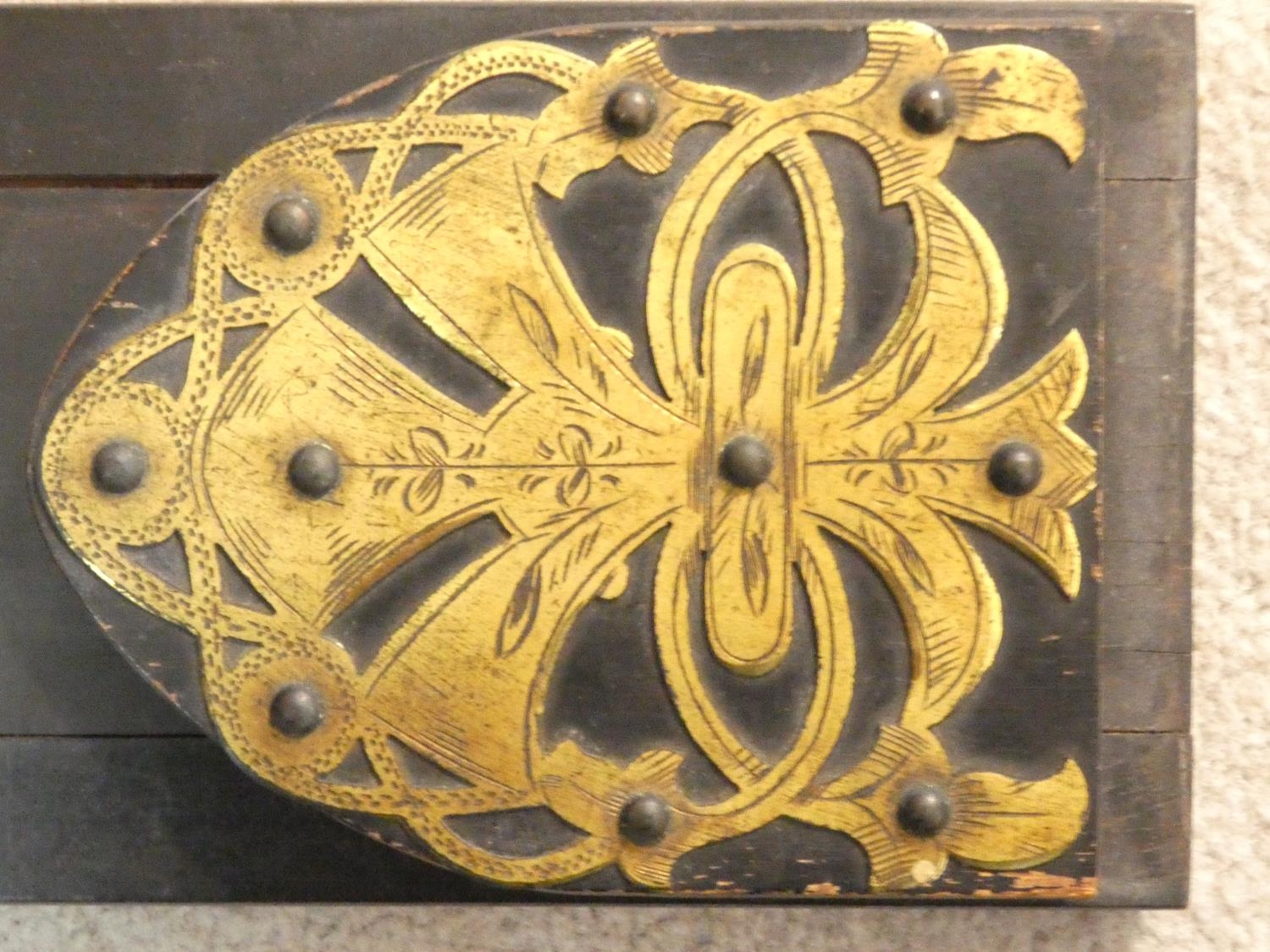 A Victorian ebonised desk top book slide with engraved pierced brass bound arched ends. 33x13cm - Image 4 of 7