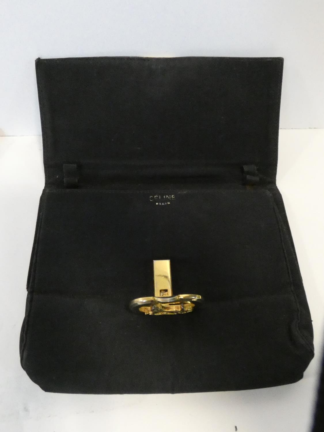A black silk Celine clutch bag retailed by Fior of Knightsbridge, with original dust bag. H.14,5xW. - Image 3 of 6