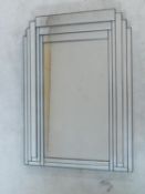 An Art Deco style overmantel mirror in glass panelled frame. 104x93cm