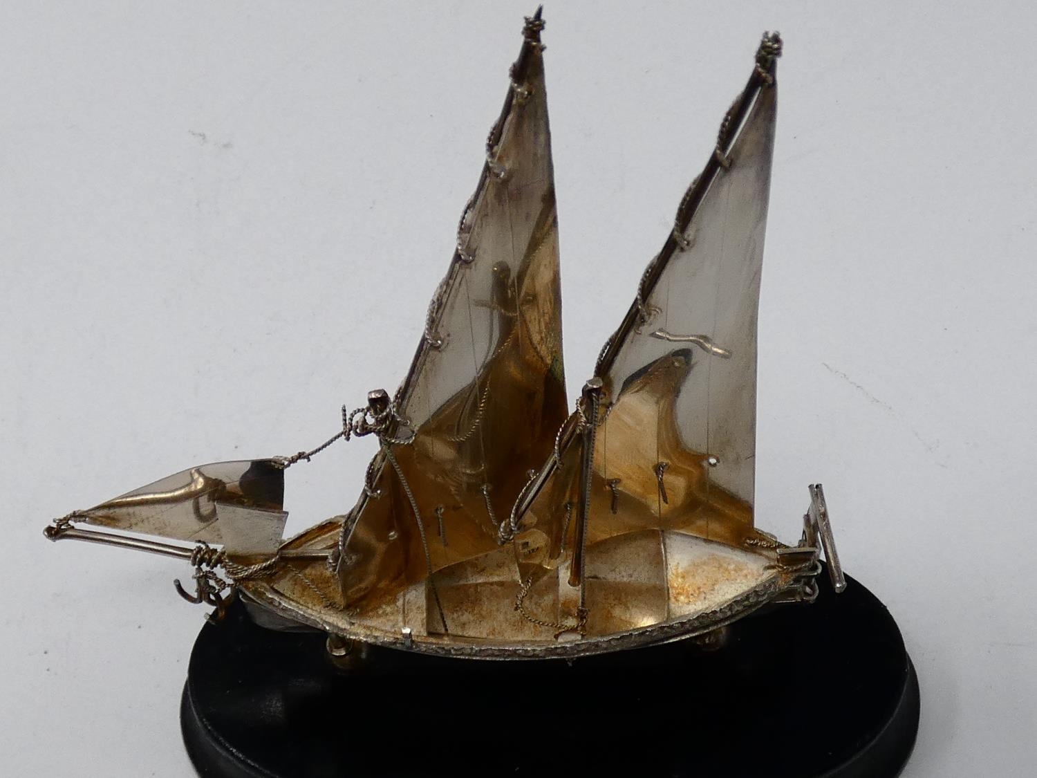 A collection of silver and white metal items. Including a Maltese articulated sailing ship on an - Image 8 of 23