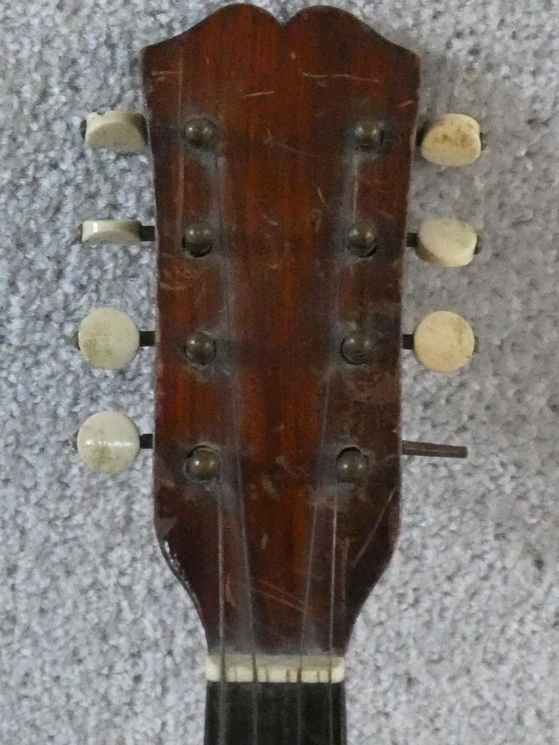 An early 20th century mandolin with mother of pearl and tortoiseshell inlay, signed Ozelli and - Image 5 of 13