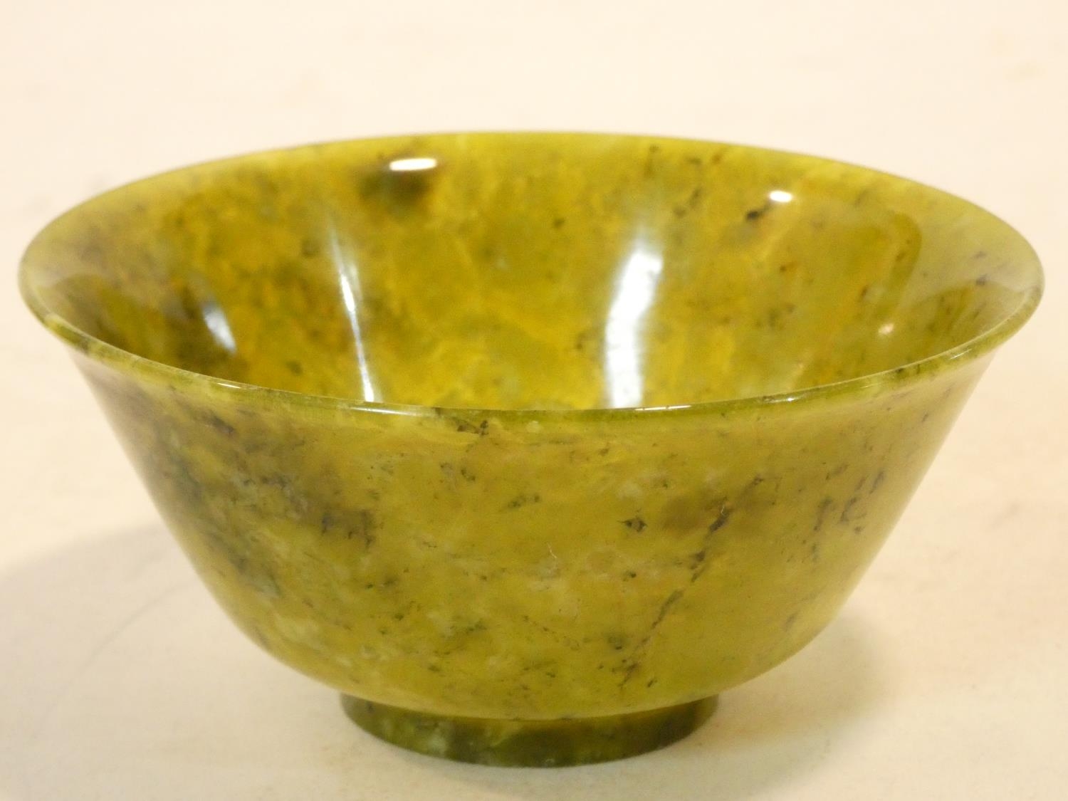 A set of four Chinese carved Spinach Jade flared rim, footed bowls along with a banded alabaster - Image 3 of 4
