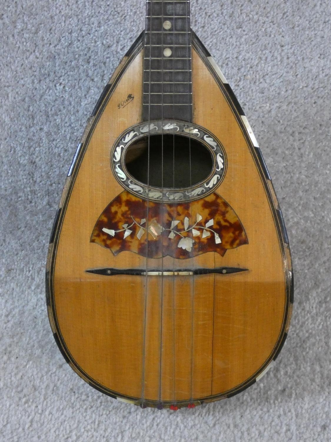 An early 20th century mandolin with mother of pearl and tortoiseshell inlay, signed Ozelli and - Image 2 of 13