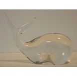 A stylised glass Murano figure of a whale by V Nason and C. H.22 W.30 D.12cm