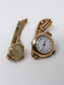 Two vintage ladies watches. One rose gold 9ct ladies watch with white enamel dial and black numbers,