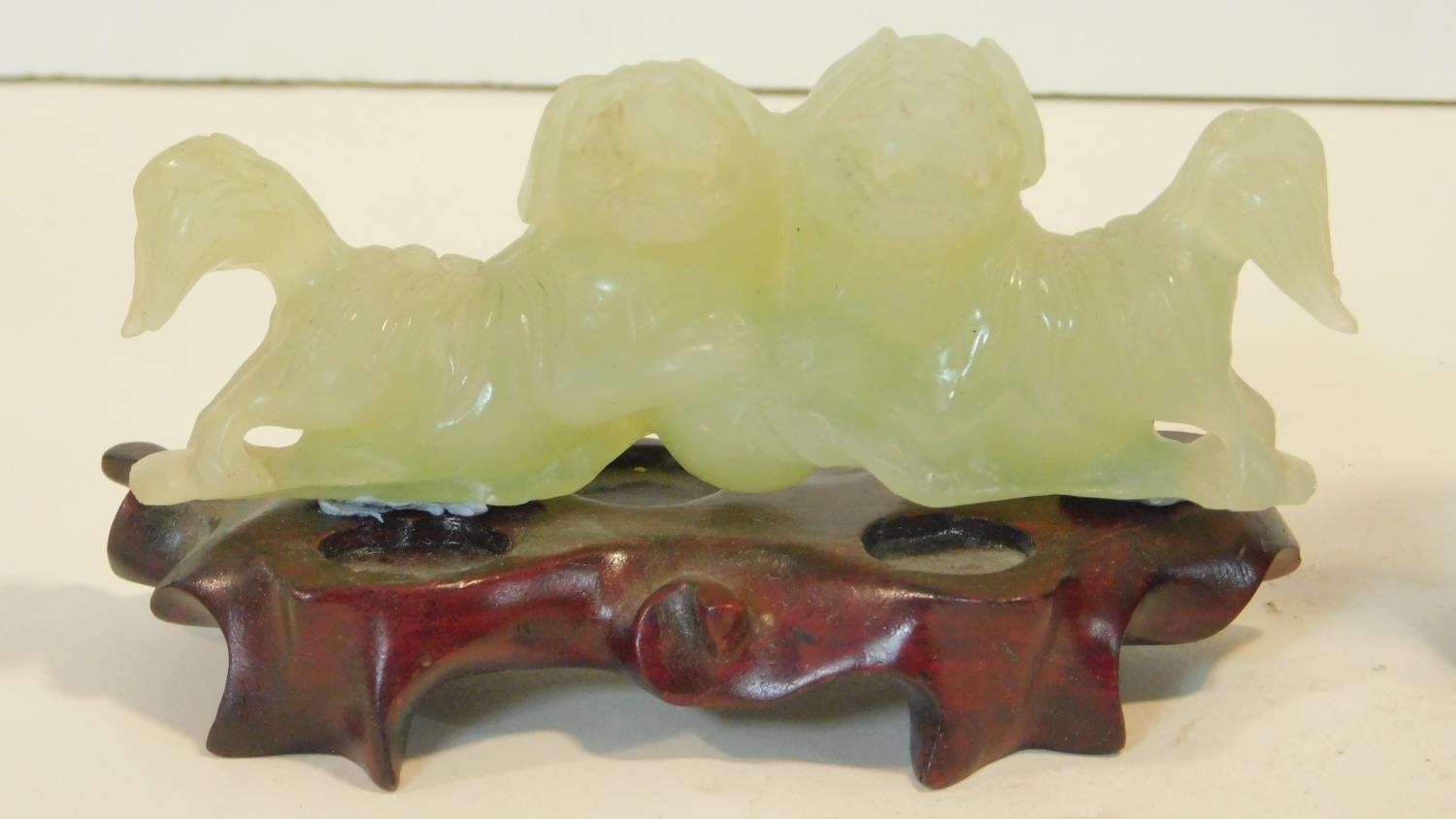 A Chinese carved jade figure of a pair of dogs on carved and pierced hardwood base and two similar - Image 2 of 8