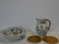 Two H B & Cie Choisy Le Roi Oriental brown majolica plates, a hand painted wild rose design wash jug