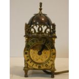 A mid century 17th century style brass lantern clock by Smiths Electrics. H.18cm (wired but not