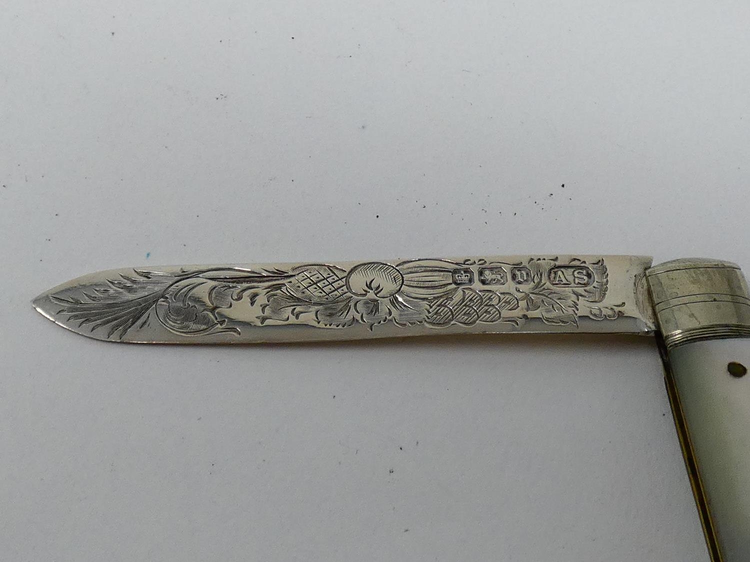Four antique silver and mother of pearl fruit knives along with a vintage miniature celluloid pen - Image 3 of 19