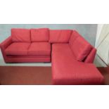 A contemporary L-shaped sofa in rose upholstery. H.71 W.190 (long end) W.134 (short end) D.80cm