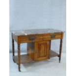 WITHDRAWN- A late 19th century walnut marble topped washstand with frieze drawers.