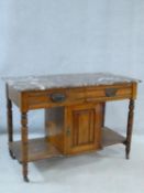 WITHDRAWN- A late 19th century walnut marble topped washstand with frieze drawers.