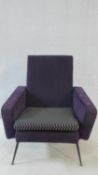 A 1960's vintage salon armchair in piped purple velour and cube design back and squab seat raised on