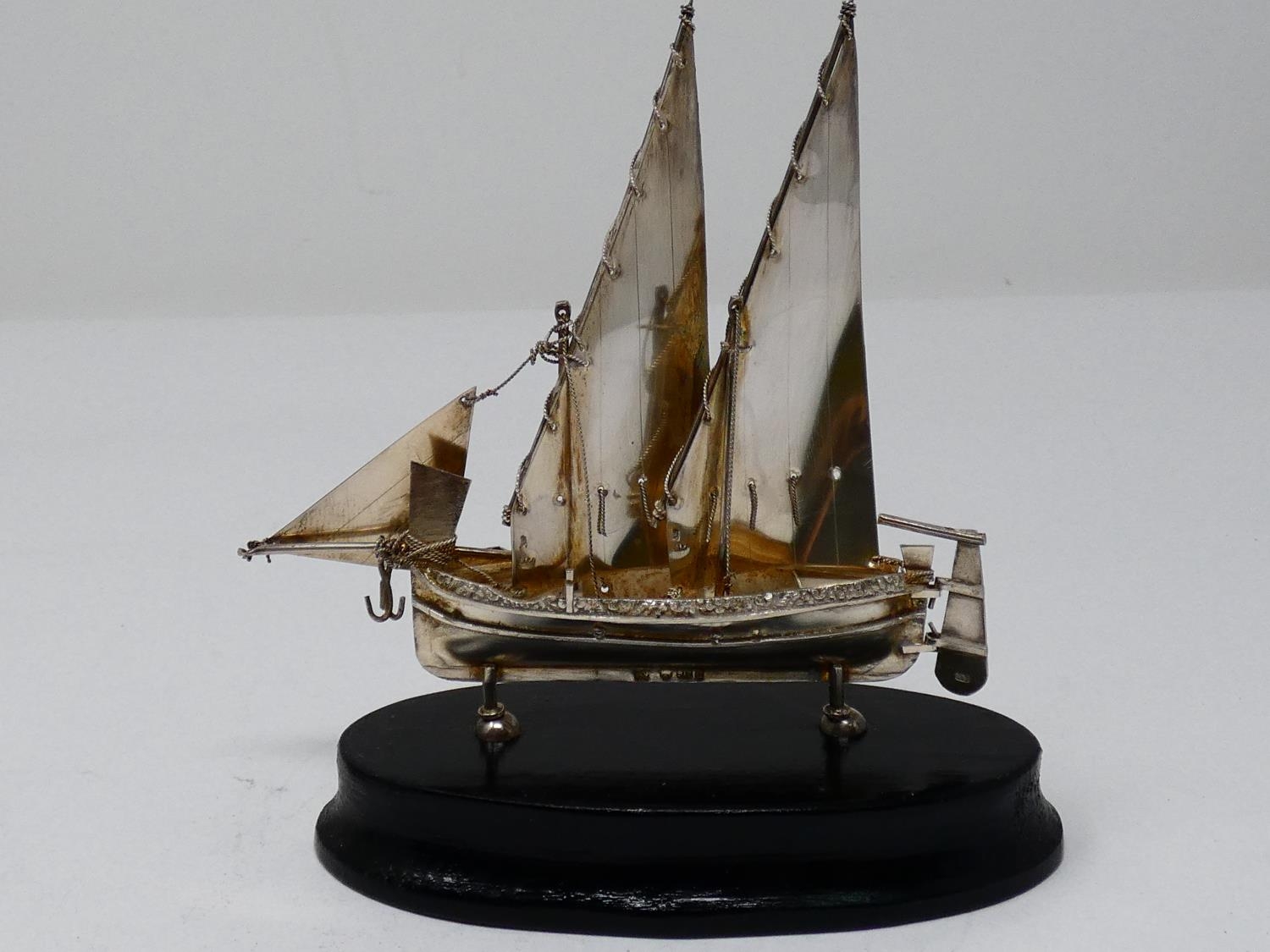 A collection of silver and white metal items. Including a Maltese articulated sailing ship on an - Image 4 of 23