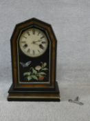 A late 19th century walnut cased mantel clock with enamel dial and Roman numerals and painted