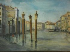 A large gilt framed and glazed watercolour, Venetian canal scene with figure seated on a quay,