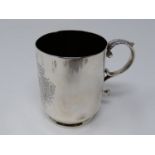 A Victorian Walker & Hall silver tankard with engraved monogram within stylized scrolling foliate