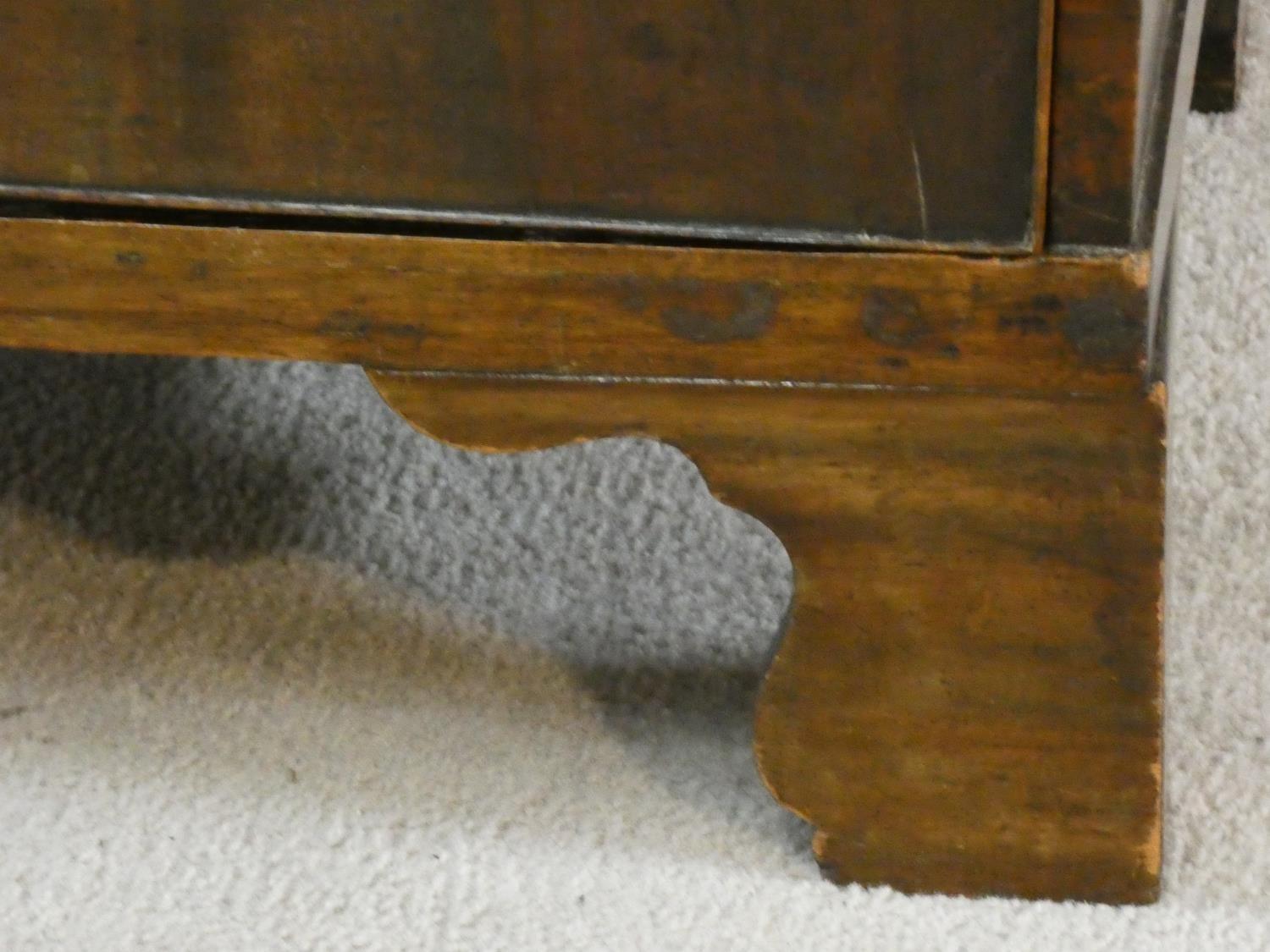 A Georgian walnut chest of three long drawers fitted with brushing slide raised on ogee bracket - Image 6 of 6