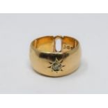 An antique 18 carat yellow gold gypsy ring set to centre with a round old cut diamond in a open back