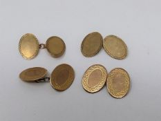 Two pairs of antique oval chain link 9ct gold cufflinks. One with an engraved stylised petal