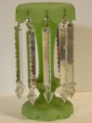 A Victorian sage green vaseline glass lustre with cut crystal drops. H.31cm