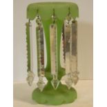 A Victorian sage green vaseline glass lustre with cut crystal drops. H.31cm