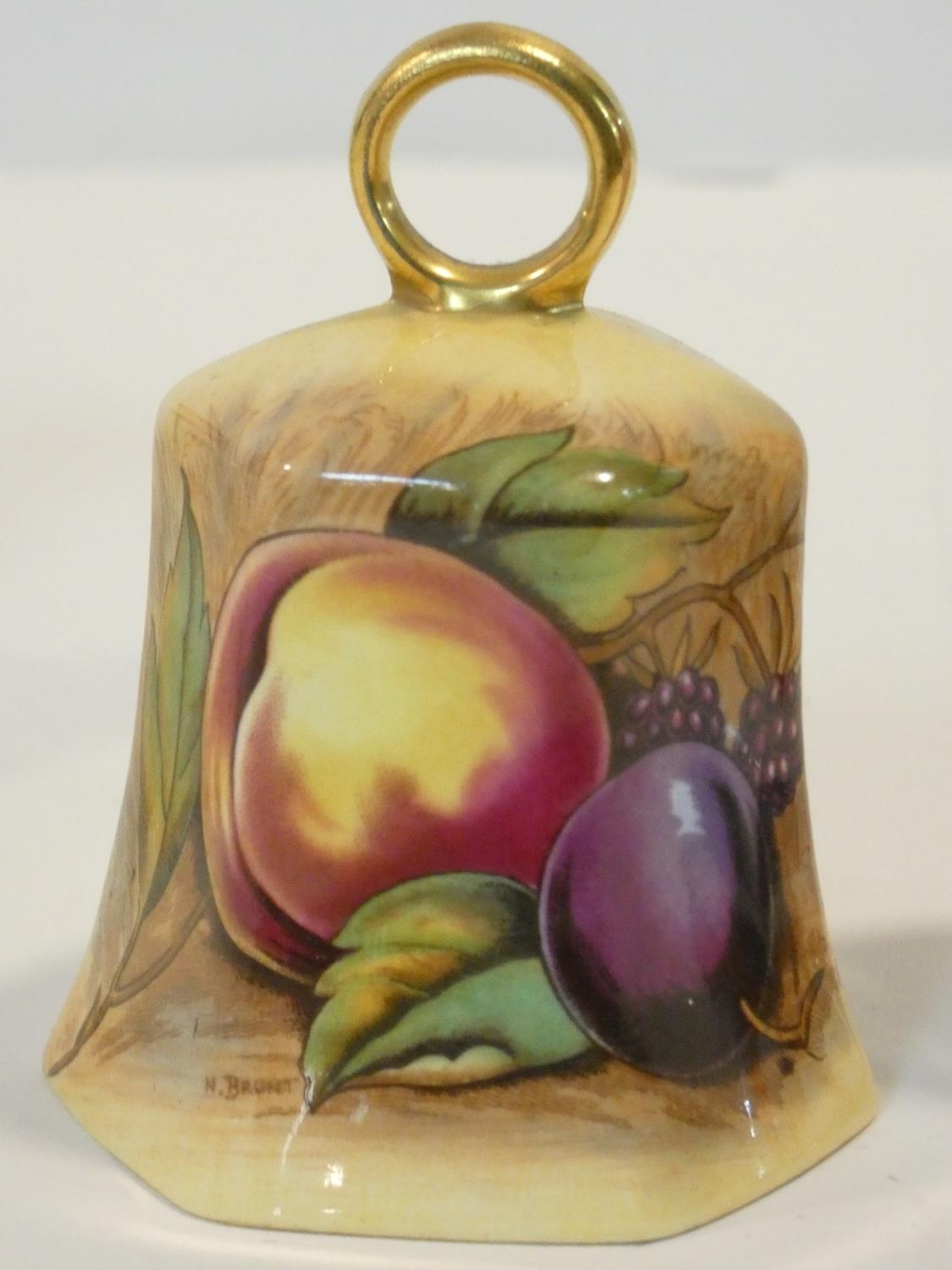A collection of porcelain items. Including an Aynsley Orchard Gold fruit design hand bell along with - Image 3 of 7