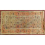 A Shirvan rug with all over repeating lozenge decoration within stylised terracotta border. 98x180cm