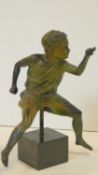 A bronze figure, study of a young boy in the Greek Classical style on black marble base. H.23cm