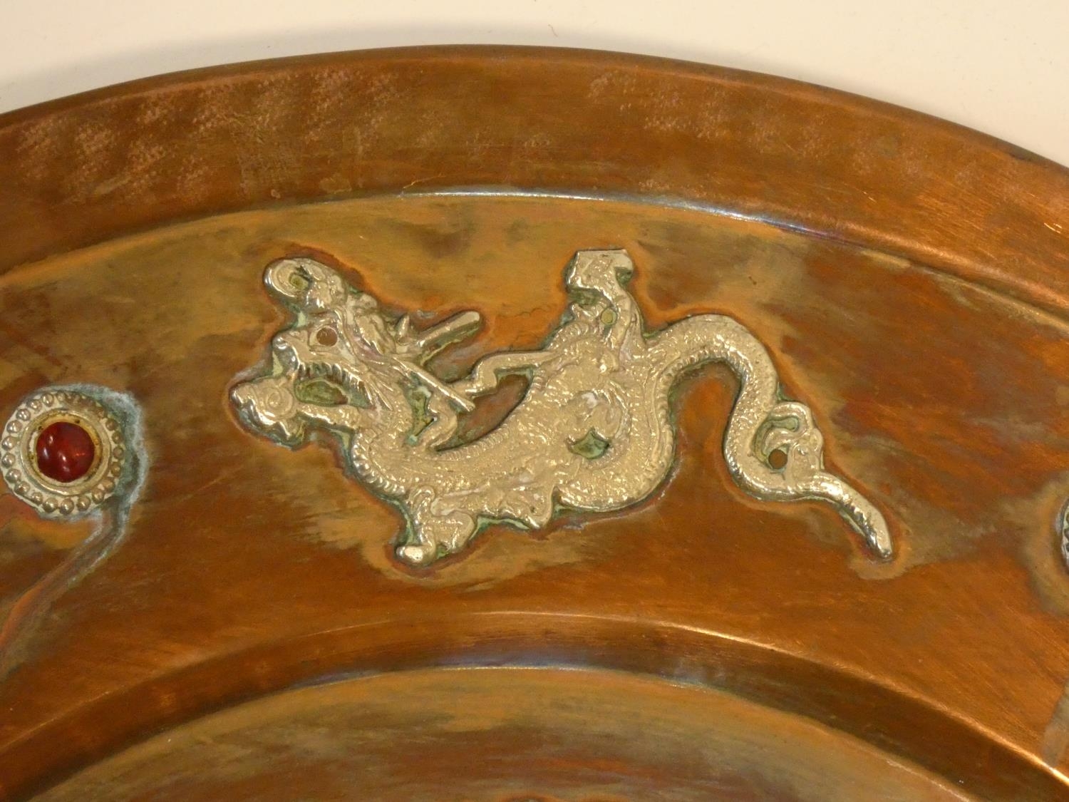 An Eastern pierced bronze charger and a Chinese copper charger with white metal dragons chasing - Image 10 of 13