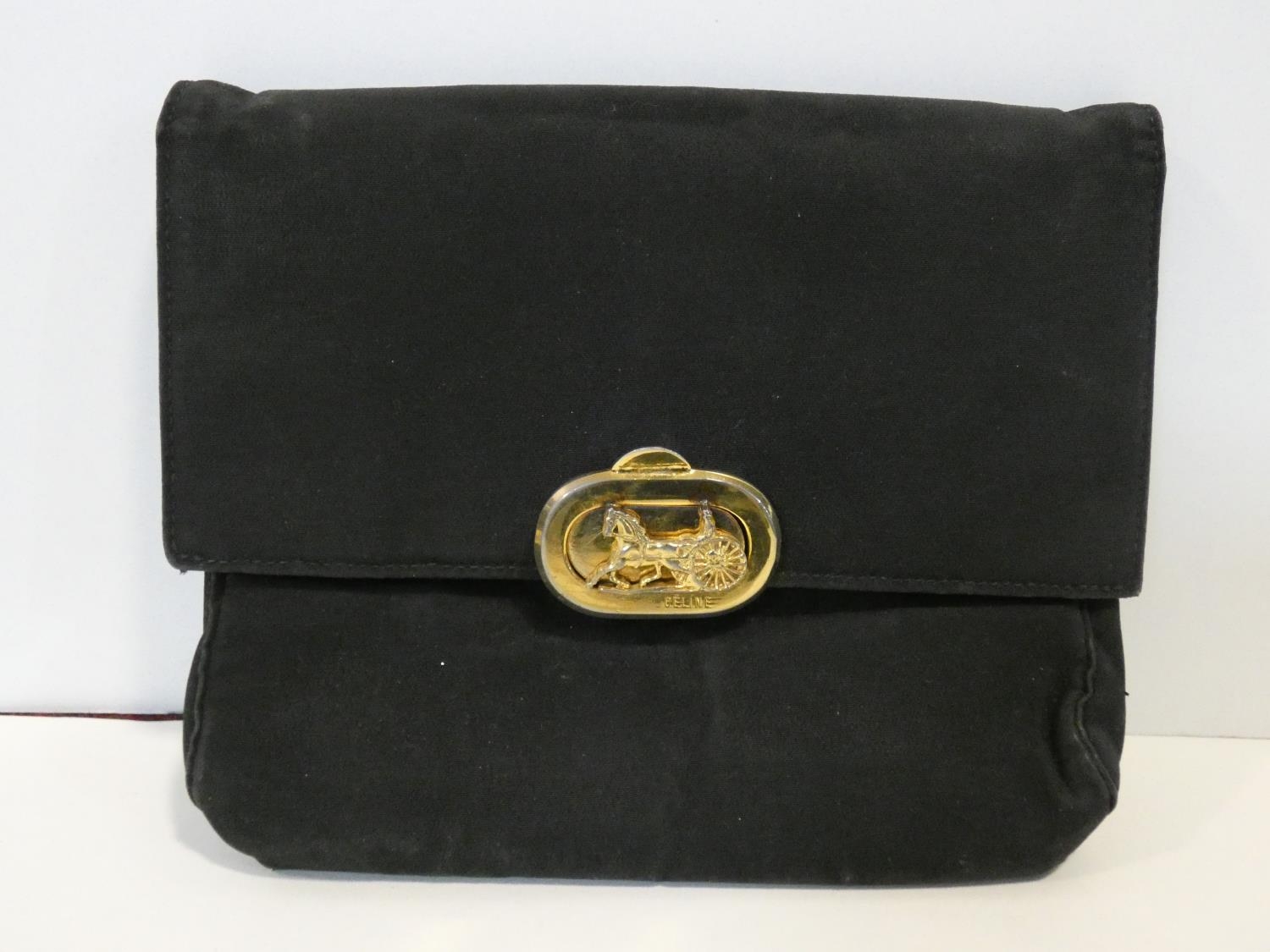 A black silk Celine clutch bag retailed by Fior of Knightsbridge, with original dust bag. H.14,5xW. - Image 2 of 6