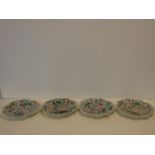 A set of four Chinese plates with all over hand painted peony decoration with makers mark to the