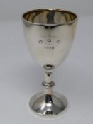 An English silver trophy cup hallmarked Birmingham, engraved D.G.C. 1938. H.13cm