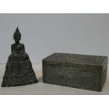 A white metal repousse design Chinese box with dragon and stylised floral design along with a