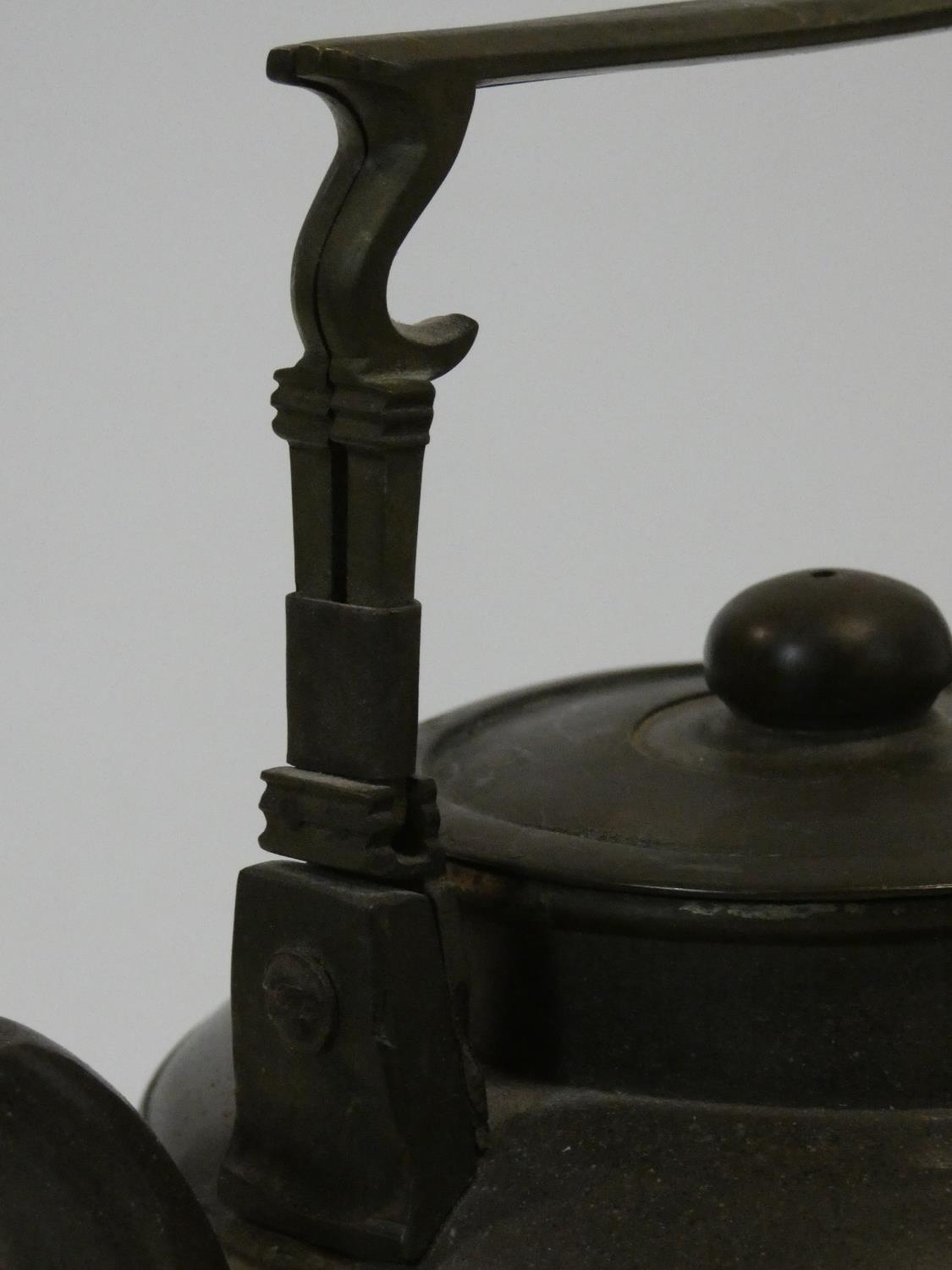 Two Chinese Yixing Pottery teapots with cast brass handles and finials and banding around the edges, - Image 5 of 11