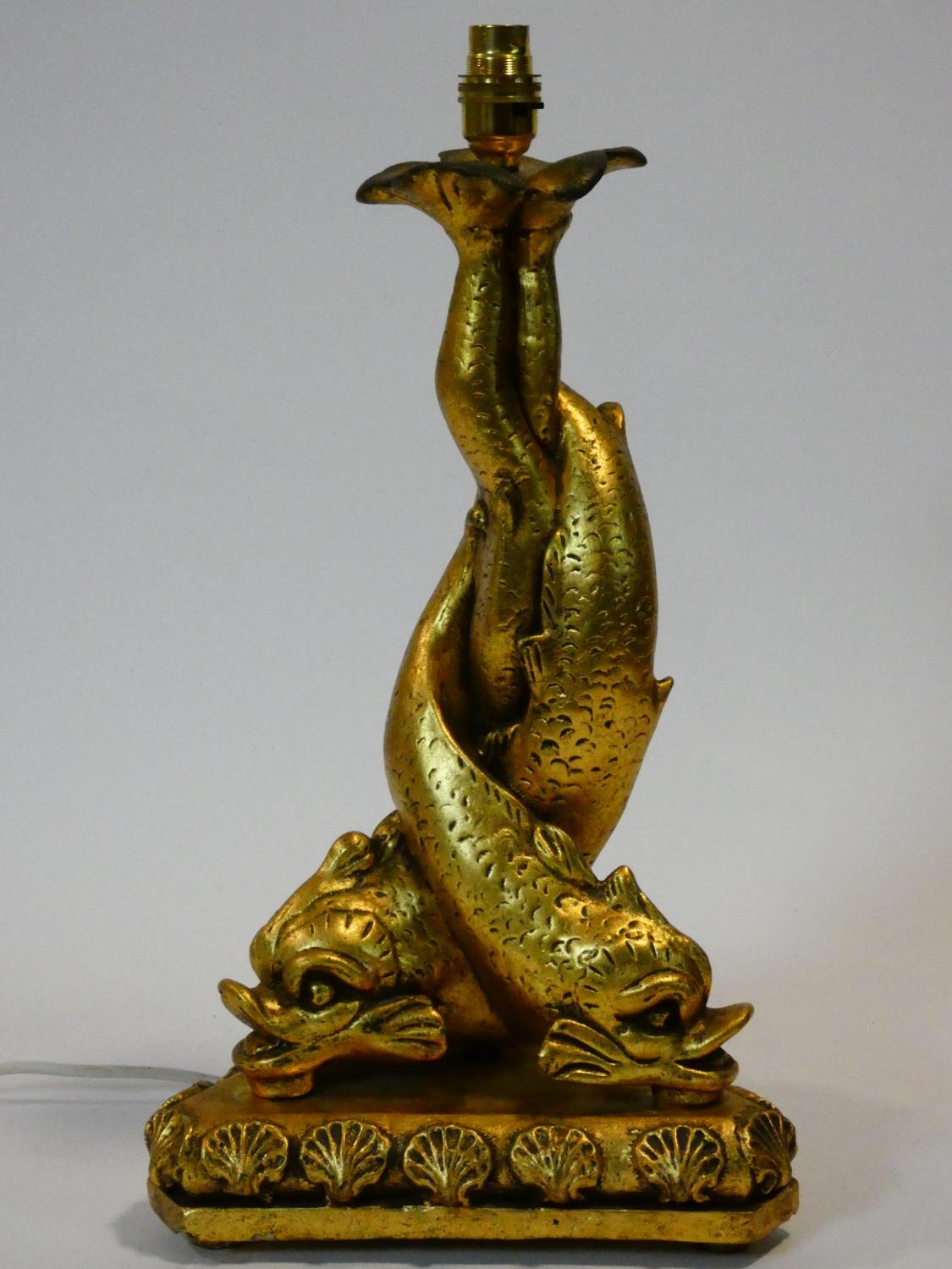 a gilt plaster lamp base in the form of three entwined Trafalgar dolphins. H.48cm