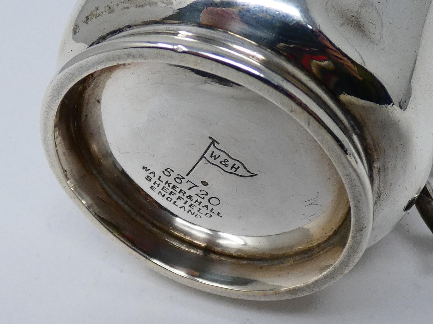 A Victorian Walker & Hall silver tankard with engraved monogram within stylized scrolling foliate - Image 6 of 7