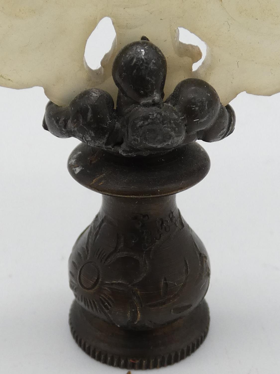 A miscellaneous collection of seven Chinese carvings in jade and coral, including figures, - Image 5 of 15