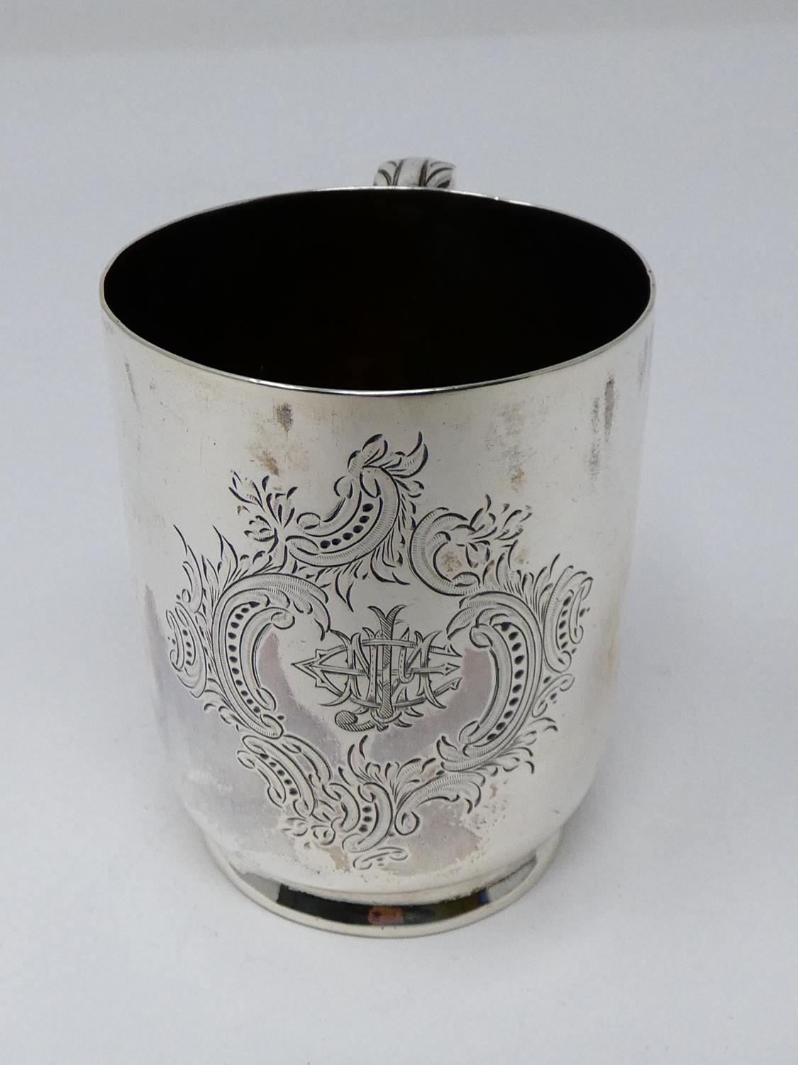 A Victorian Walker & Hall silver tankard with engraved monogram within stylized scrolling foliate - Image 4 of 7