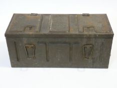a WW2 metal ammuniition box with twin carrying handles and raised numbers and letters 'BLSP, 1943'