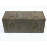 a WW2 metal ammuniition box with twin carrying handles and raised numbers and letters 'BLSP, 1943'