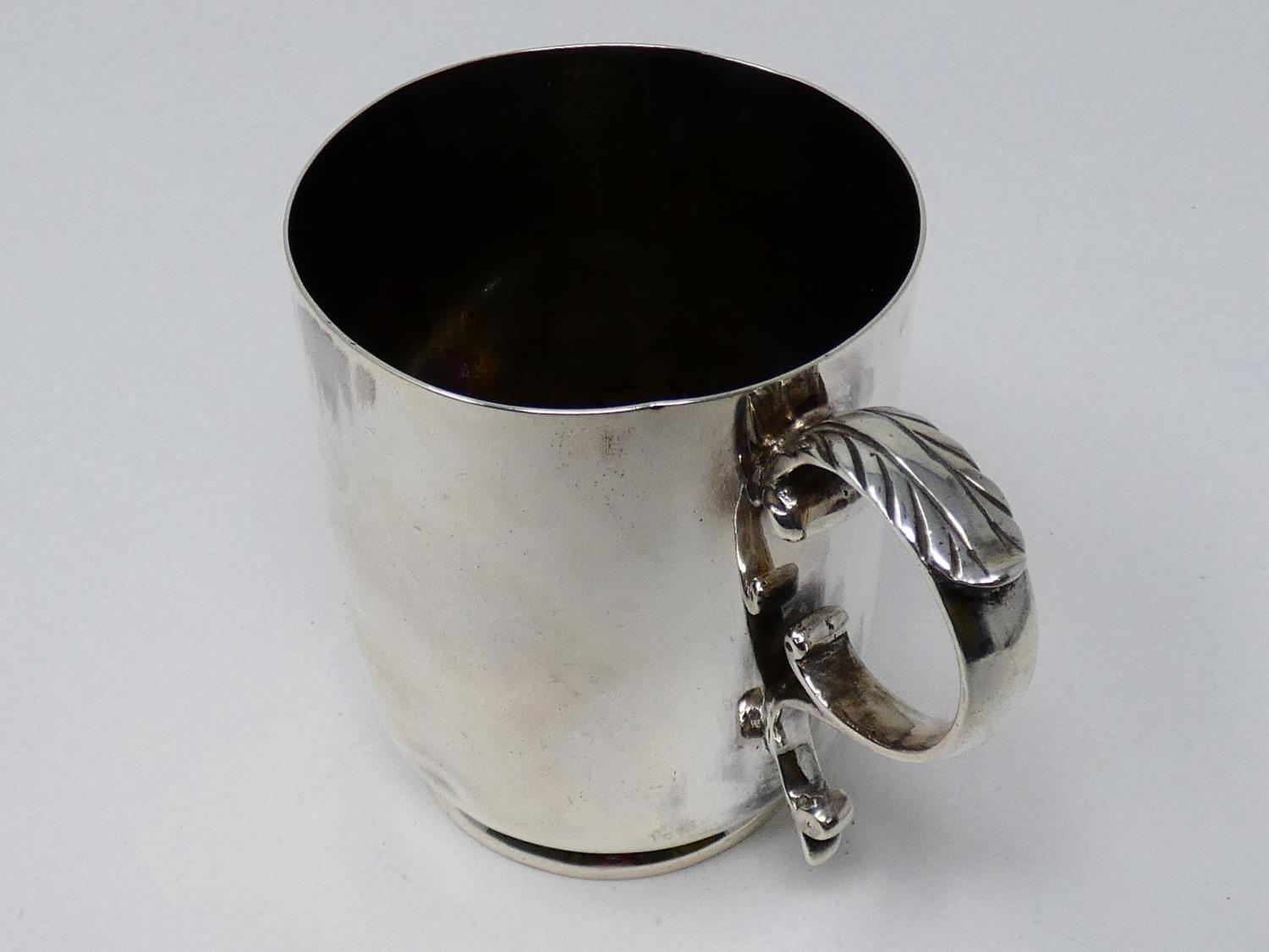 A Victorian Walker & Hall silver tankard with engraved monogram within stylized scrolling foliate - Image 7 of 7