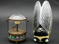 An animated vintage angel fish aquarium clock with moving fish, brass base with cloisonne enamel and