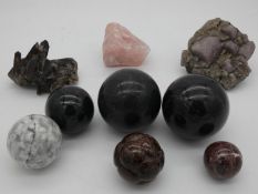 A miscellaneous collection of various marble spheres and rock crystal specimens. 10x10cm (largest)