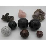 A miscellaneous collection of various marble spheres and rock crystal specimens. 10x10cm (largest)