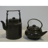 Two Chinese Yixing Pottery teapots with cast brass handles and finials and banding around the edges,